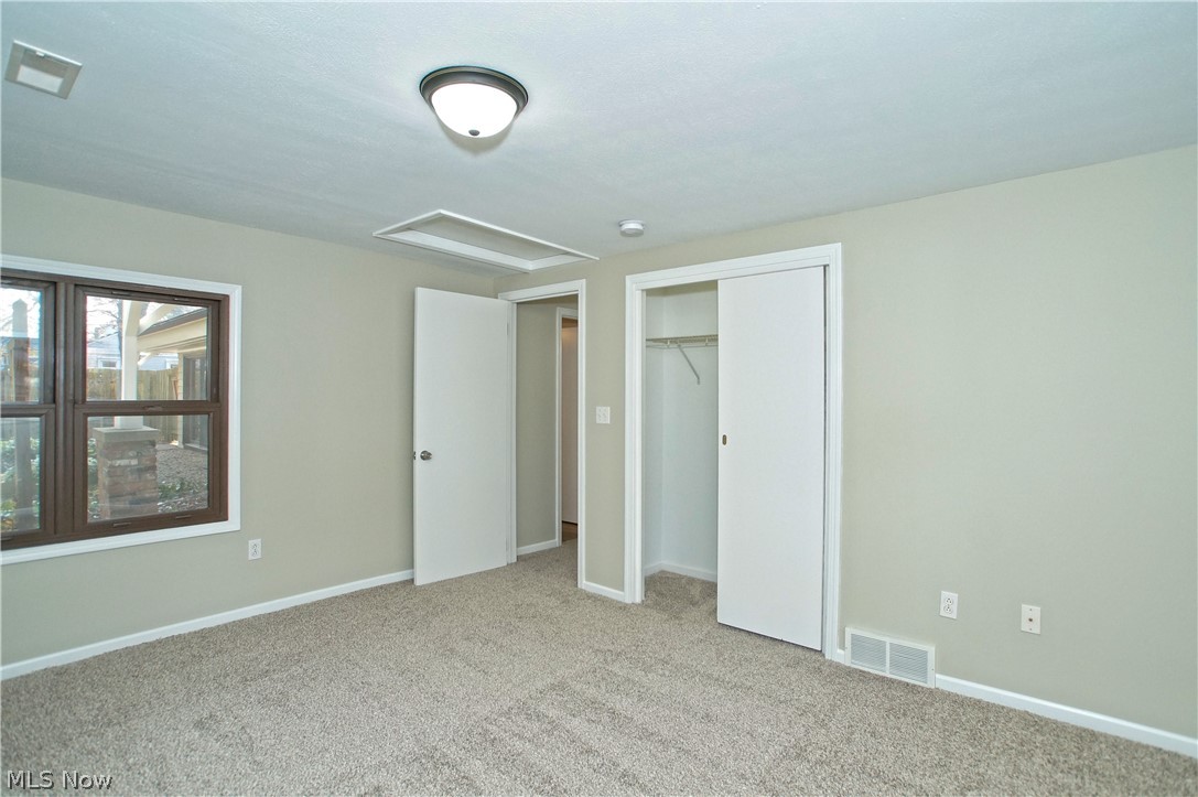 8063 Middlesex Road Mentor, OH 44060 - Photo 15 of 35 The back bedroom has windows on 3 sides and overlooks the back yard and patio area.