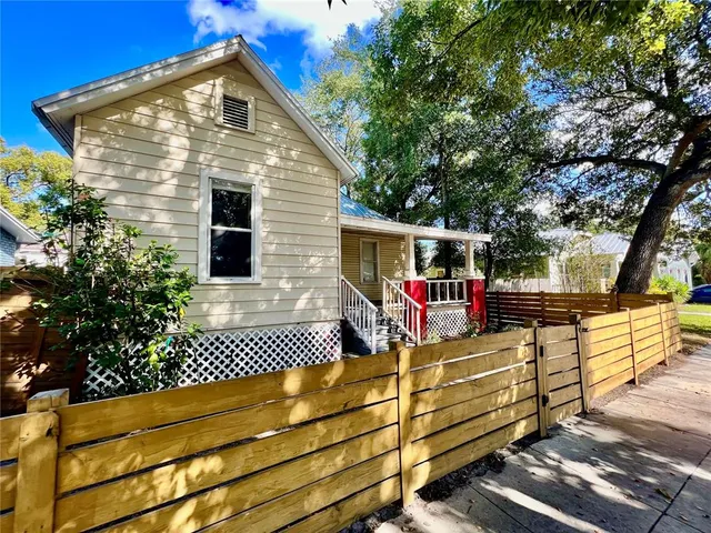 a view of a deck with a wooden fence