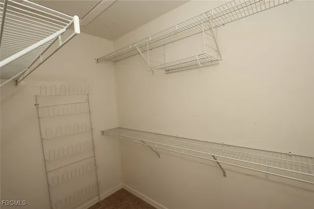 a view of a room with racks on the wall