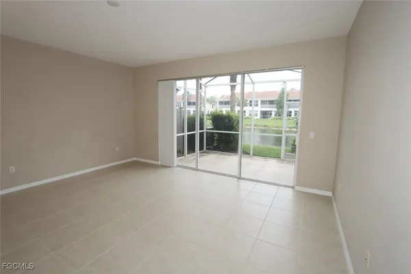 a view of a room with sliding glass door