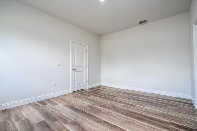 a view of a small space with racks on the wall