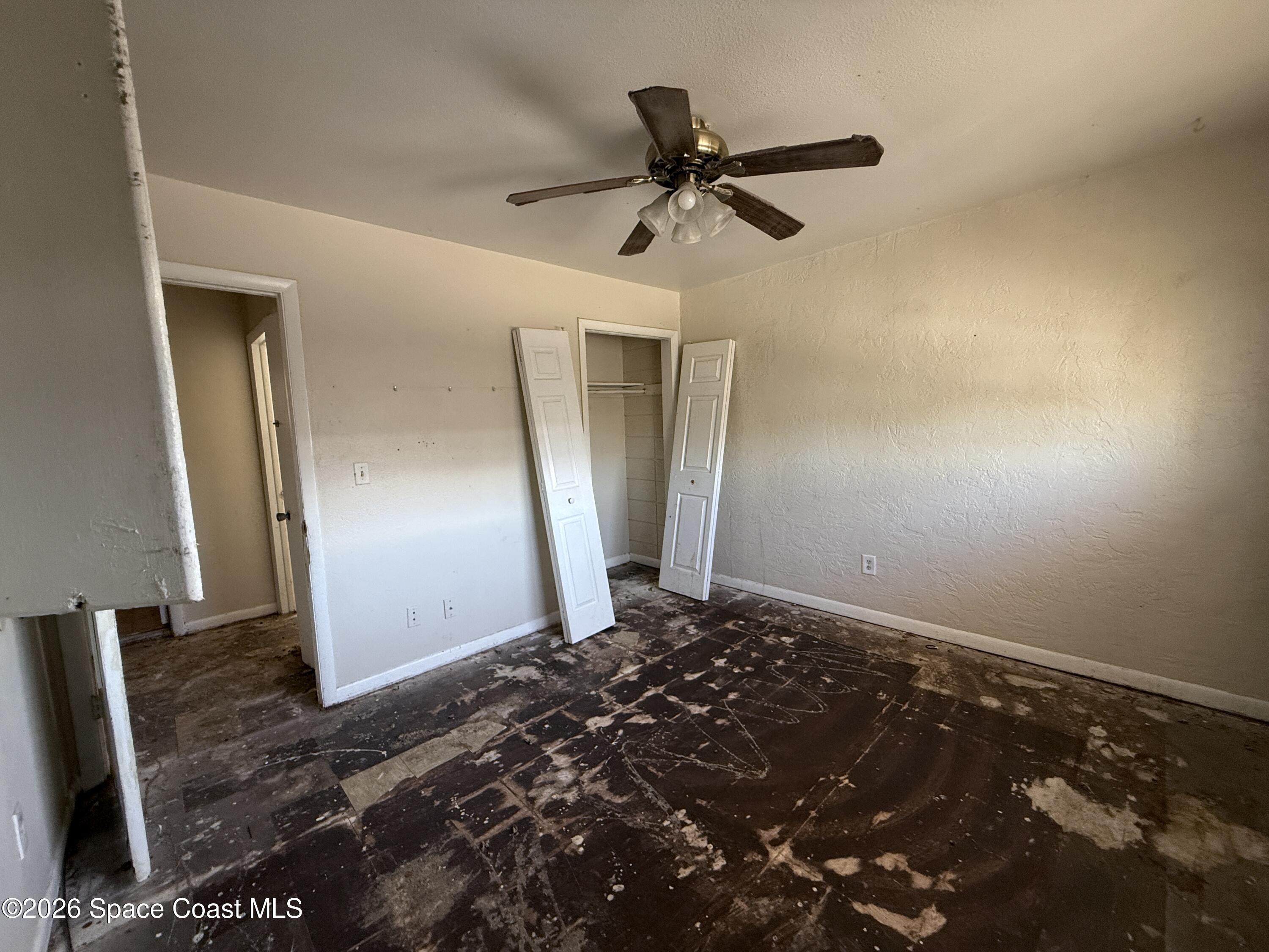 27 Ella Street, Unit B Melbourne, FL 32935 - Photo 16 of 18 a view of a big room with wooden floor