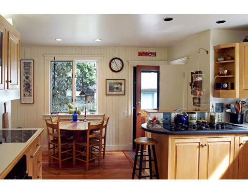 22 Lakeview Road Winchester, MA 01890 - Photo 3 of 12 a kitchen with a table and chairs in it