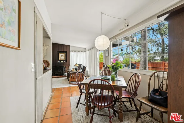 a view of a gallery with wooden floor
