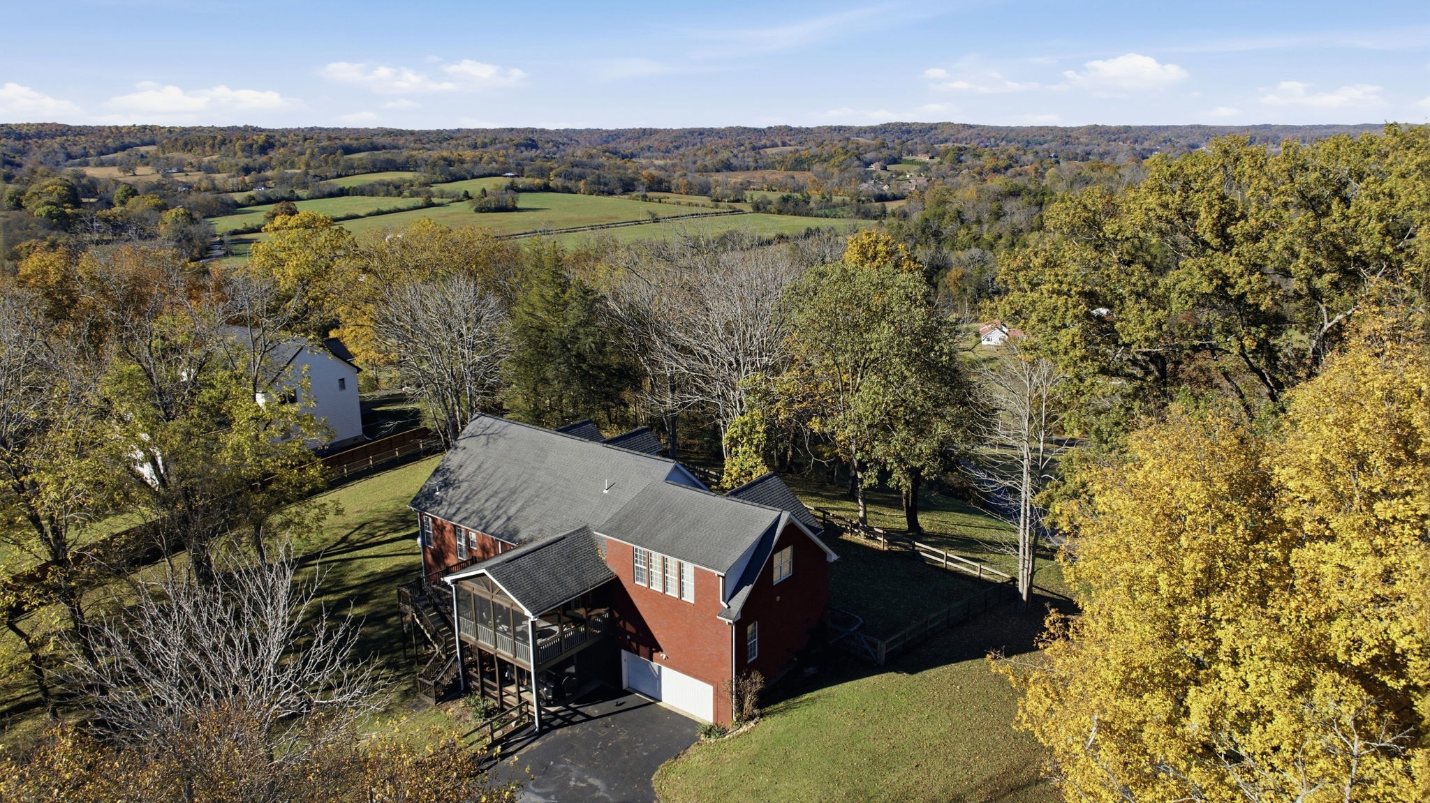 663 Cummings Lane Cottontown, TN 37048 - Photo 12 of 41 an aerial view of a house with a yard and lake view