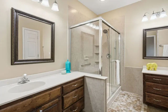 a bathroom with a sink a vanity and a mirror
