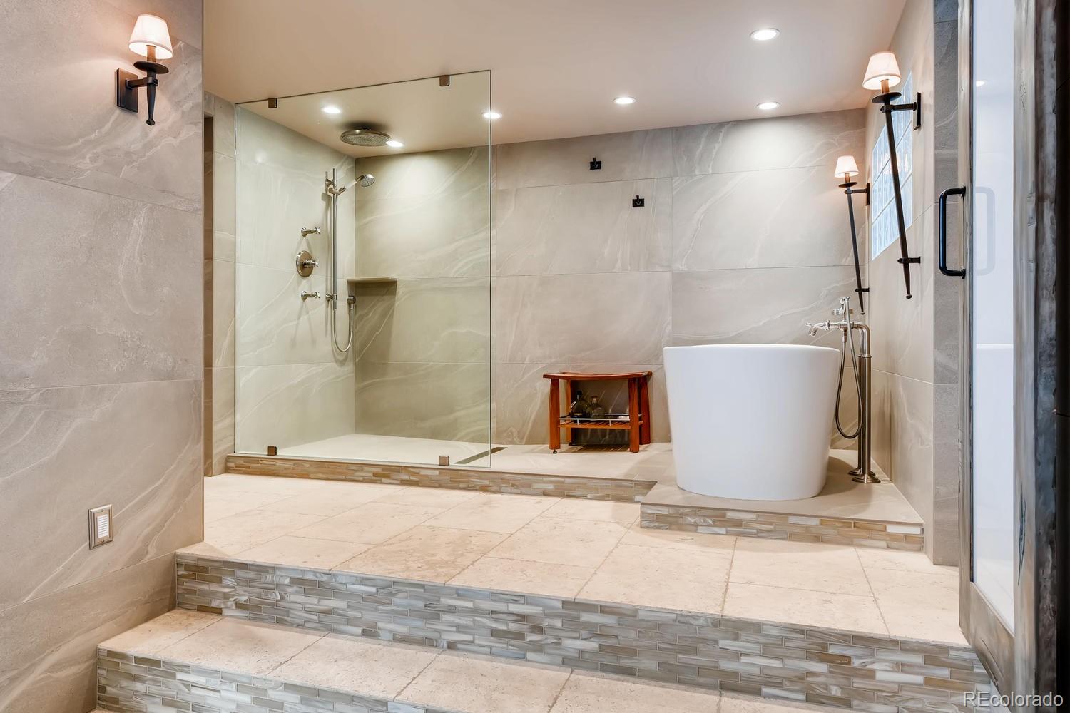 30403 Upper Bear Creek Road Evergreen, CO 80439 - Photo 28 of 40 a bathroom with a shower