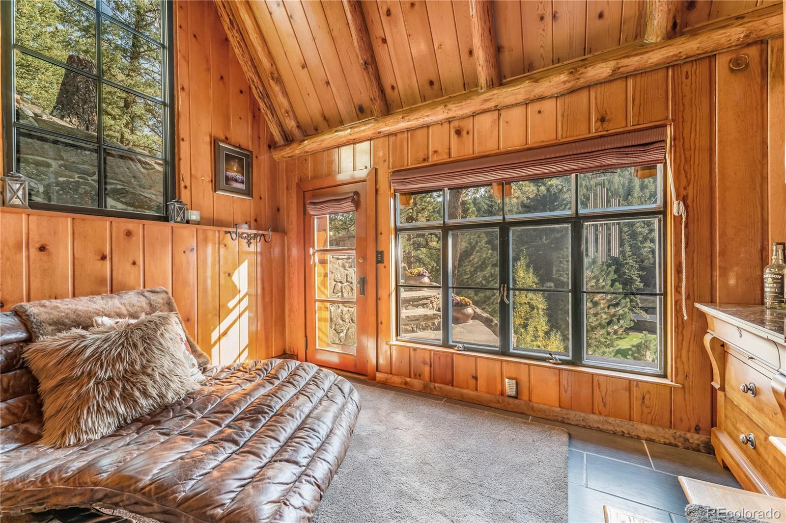30403 Upper Bear Creek Road Evergreen, CO 80439 - Photo 29 of 40 a view of a porch