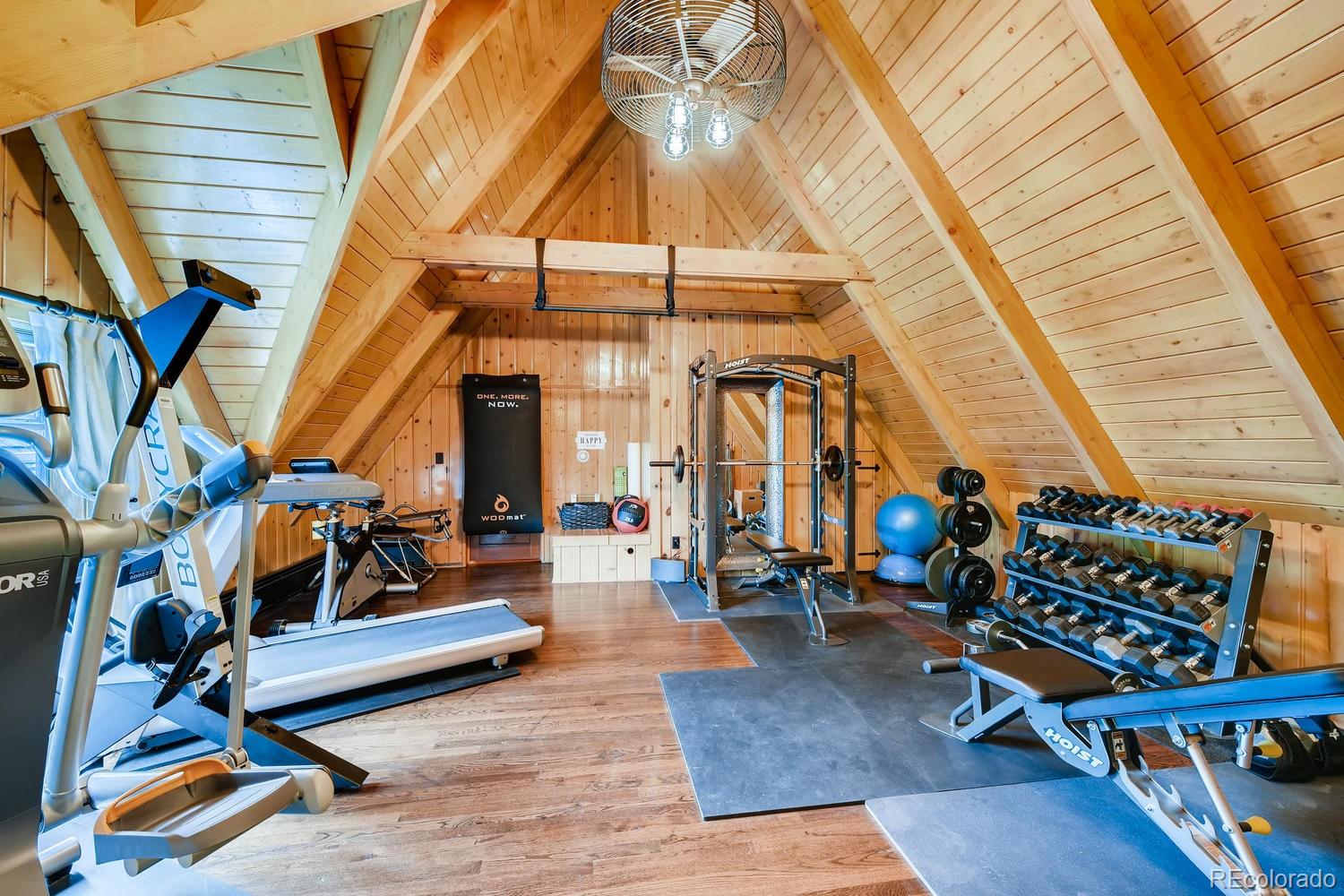 30403 Upper Bear Creek Road Evergreen, CO 80439 - Photo 35 of 40 a sitting area with an outdoor seating