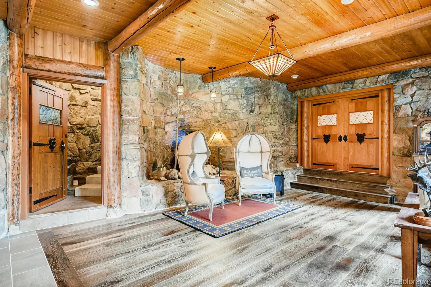 30403 Upper Bear Creek Road Evergreen, CO 80439 - Photo 5 of 40 a room with gym equipment