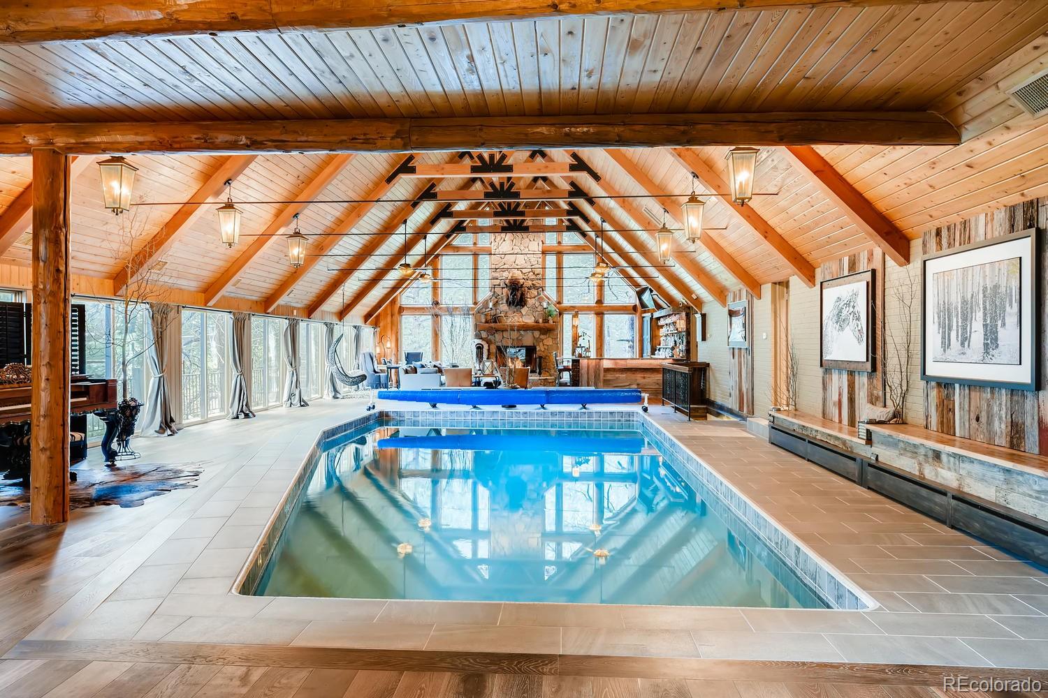 30403 Upper Bear Creek Road Evergreen, CO 80439 - Photo 10 of 40 a view of swimming pool with seating area