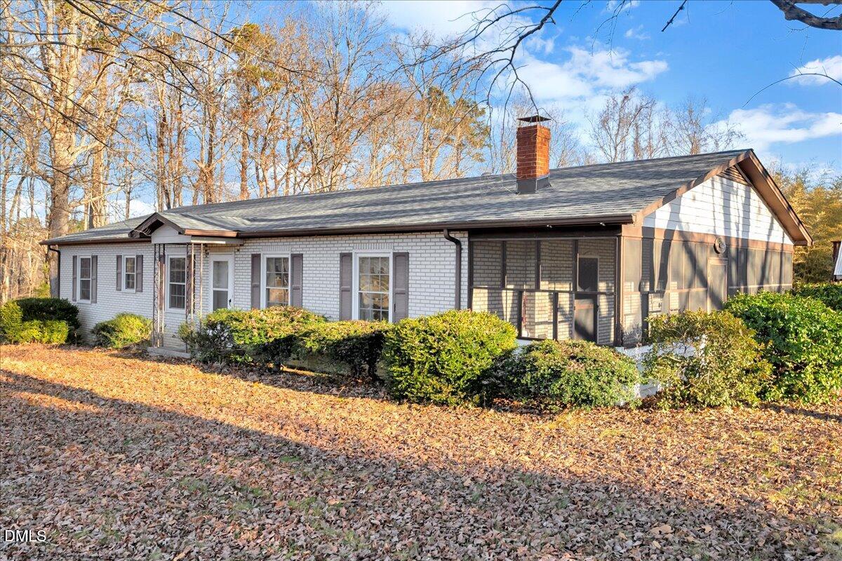4049 Highway 58 Buffalo Junction, VA 24529 - Photo 1 of 21 a front view of a house with yard