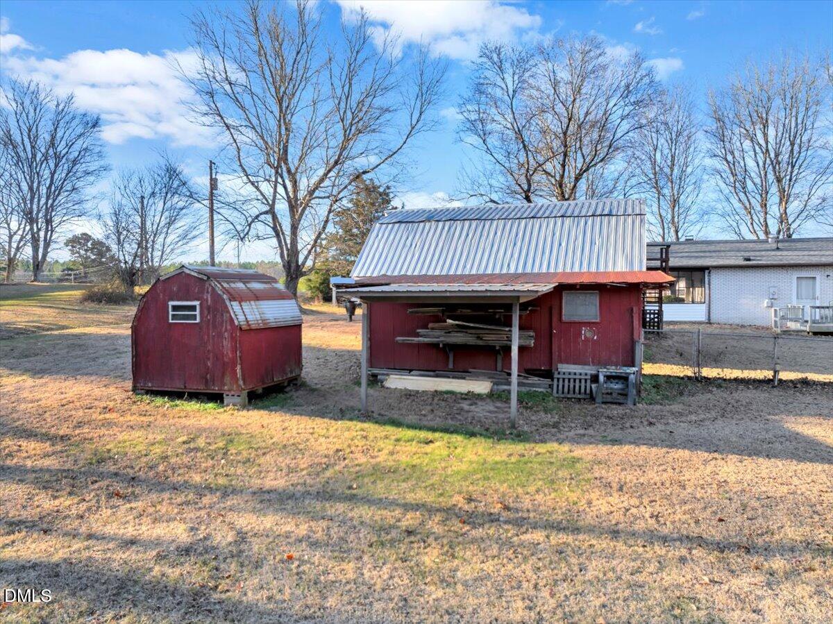 4049 Highway 58 Buffalo Junction, VA 24529 - Photo 19 of 21 a view of a house with a back yard
