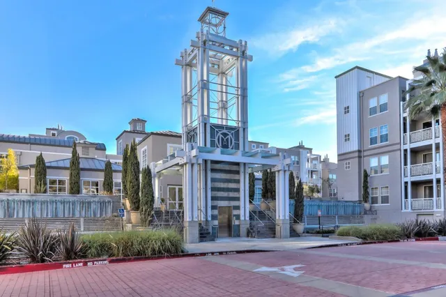 a front view of building with yard