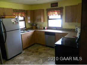519 Limestone Road Verona, VA 24482 - Photo 6 of 10 a kitchen with a refrigerator and a sink