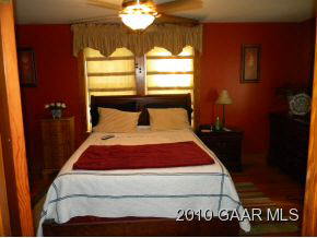519 Limestone Road Verona, VA 24482 - Photo 8 of 10 a bedroom with a bed and window