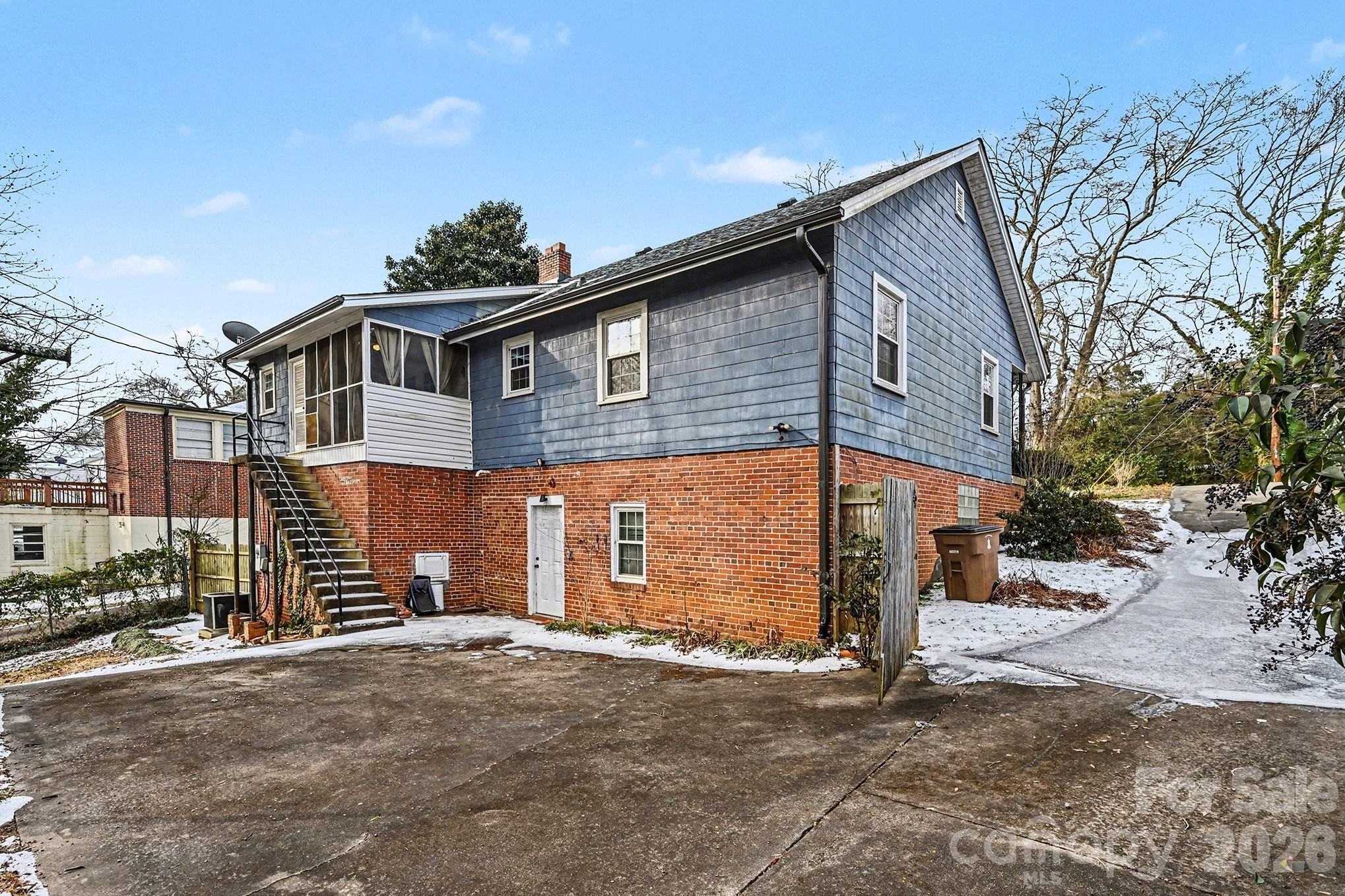 409 Miles Road Shelby, NC 28150 - Photo 20 of 23 a front view of a house with a yard