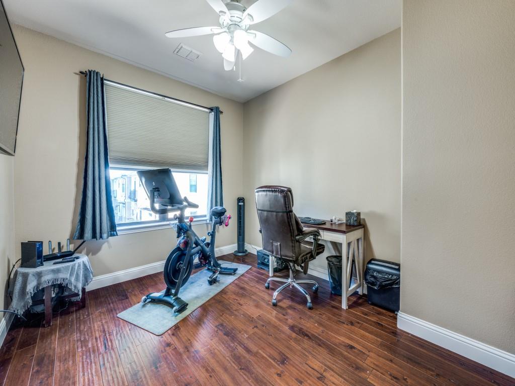 5721 Lunsford Road Plano, TX 75024 - Photo 14 of 17 a view of a workspace with wooden floor and a workspace