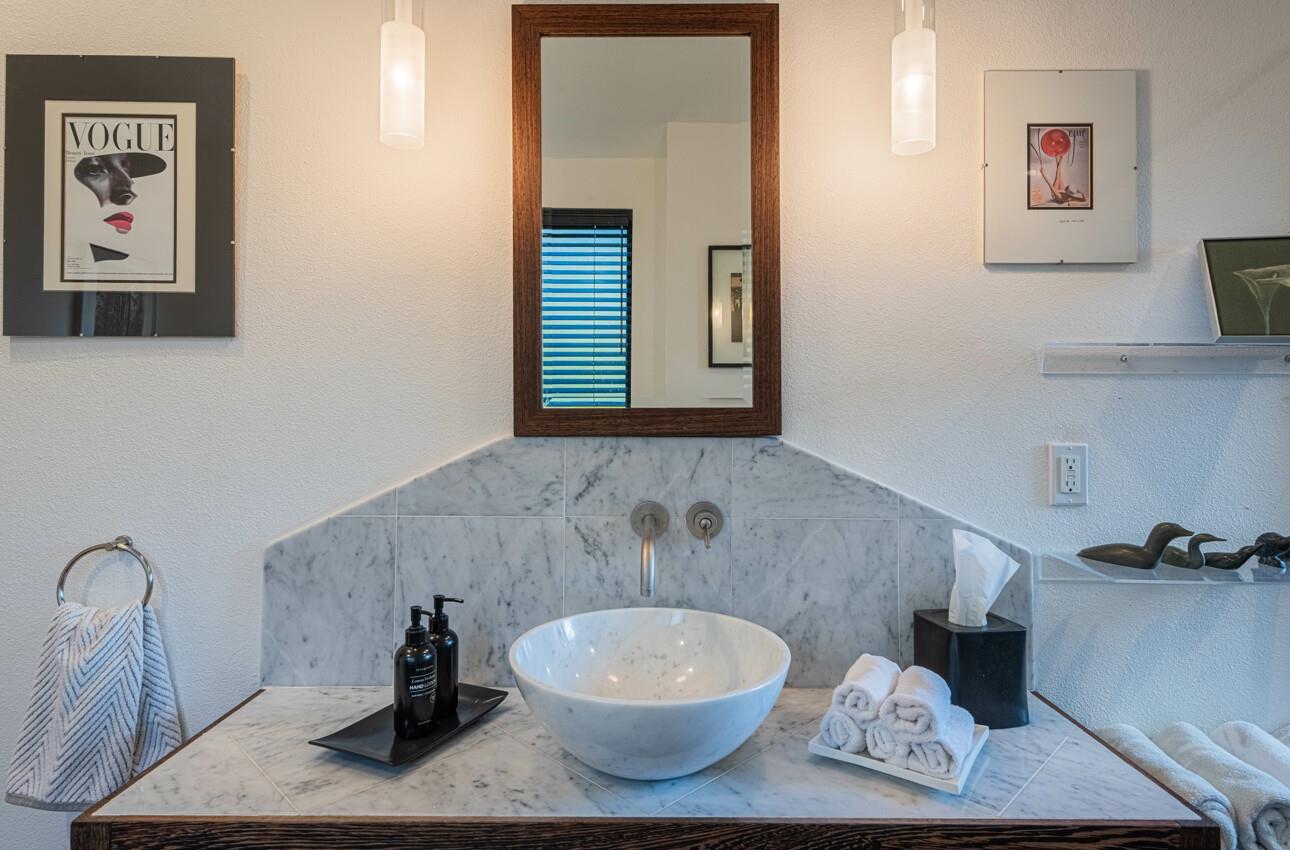 3472 Lazarro Drive Carmel, CA 93923 - Photo 14 of 35 a bathroom with a toilet and a sink