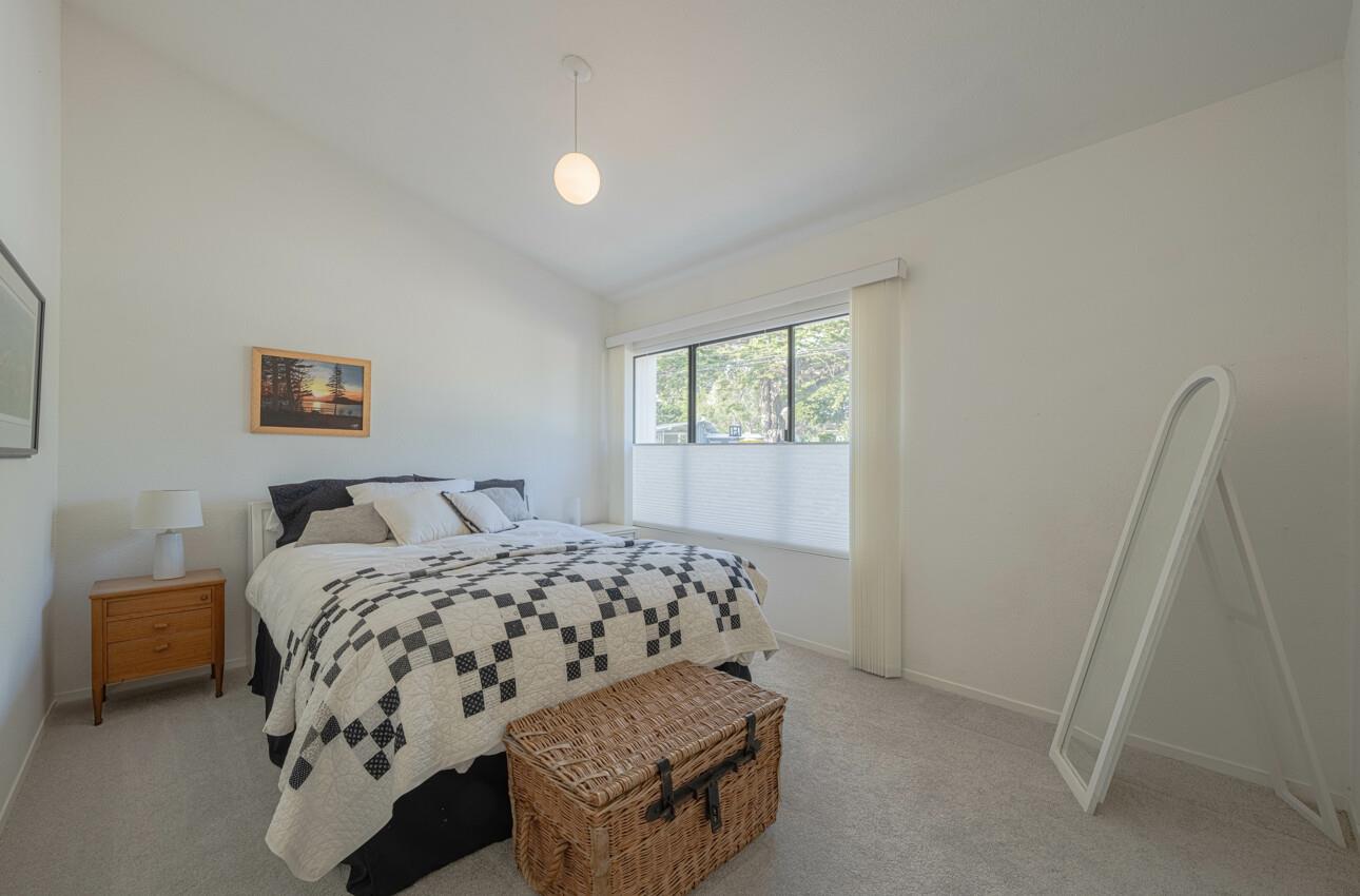 3472 Lazarro Drive Carmel, CA 93923 - Photo 25 of 35 a bedroom with a bed and a window
