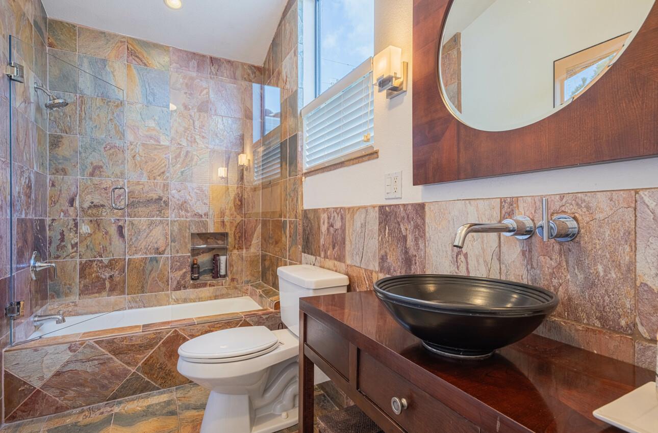 3472 Lazarro Drive Carmel, CA 93923 - Photo 26 of 35 a bathroom with a toilet and a mirror