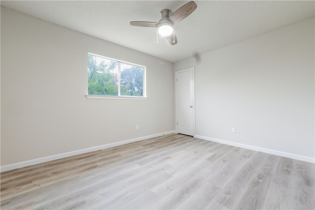 3901 Skipton Drive Austin, TX 78727 - Photo 14 of 21 an empty room with a window