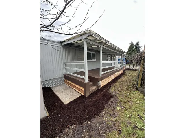 a house sitting area with view of a house