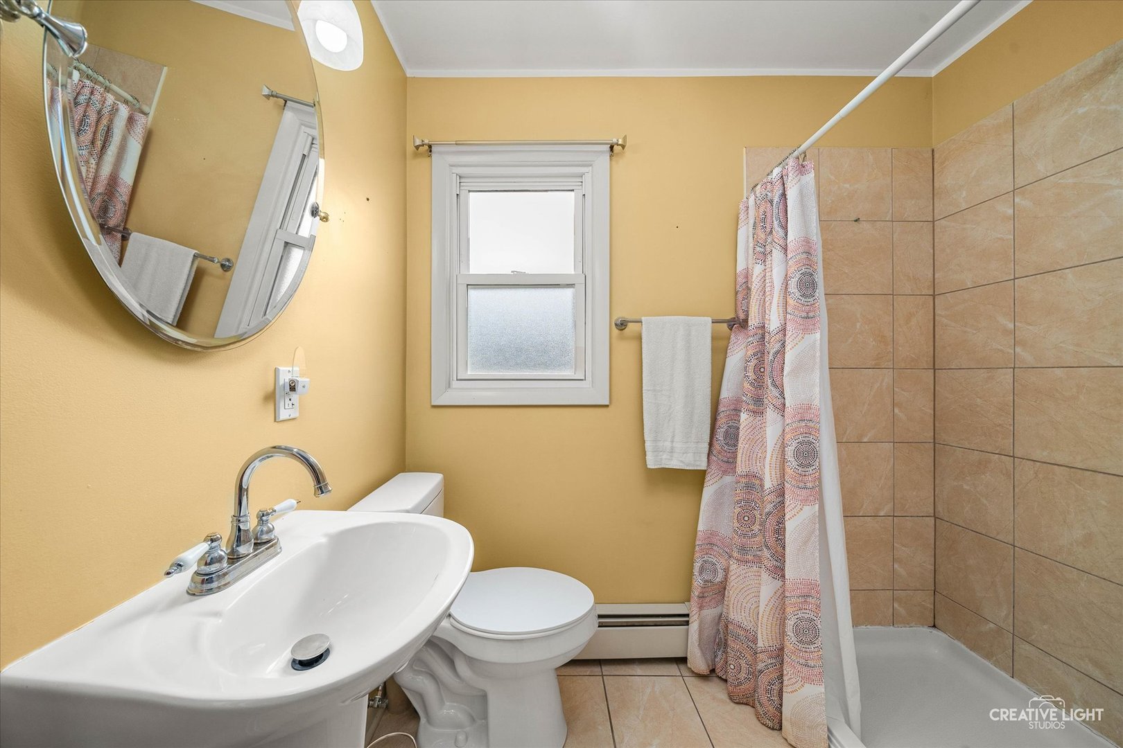 457 West Spring Street South Elgin, IL 60177 - Photo 10 of 21 a bathroom with a sink toilet and a mirror