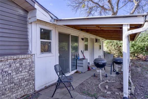 a outdoor seating area with furniture