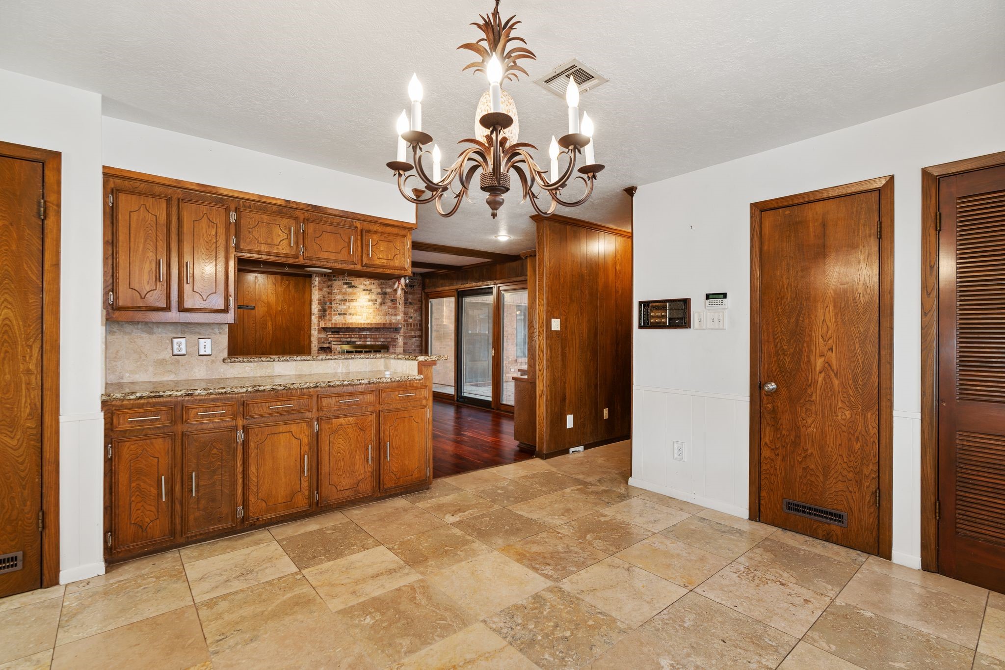 1043 Martin Street Houston, TX 77018 - Photo 20 of 45 a spacious bathroom with a granite countertop sink a mirror and a shower