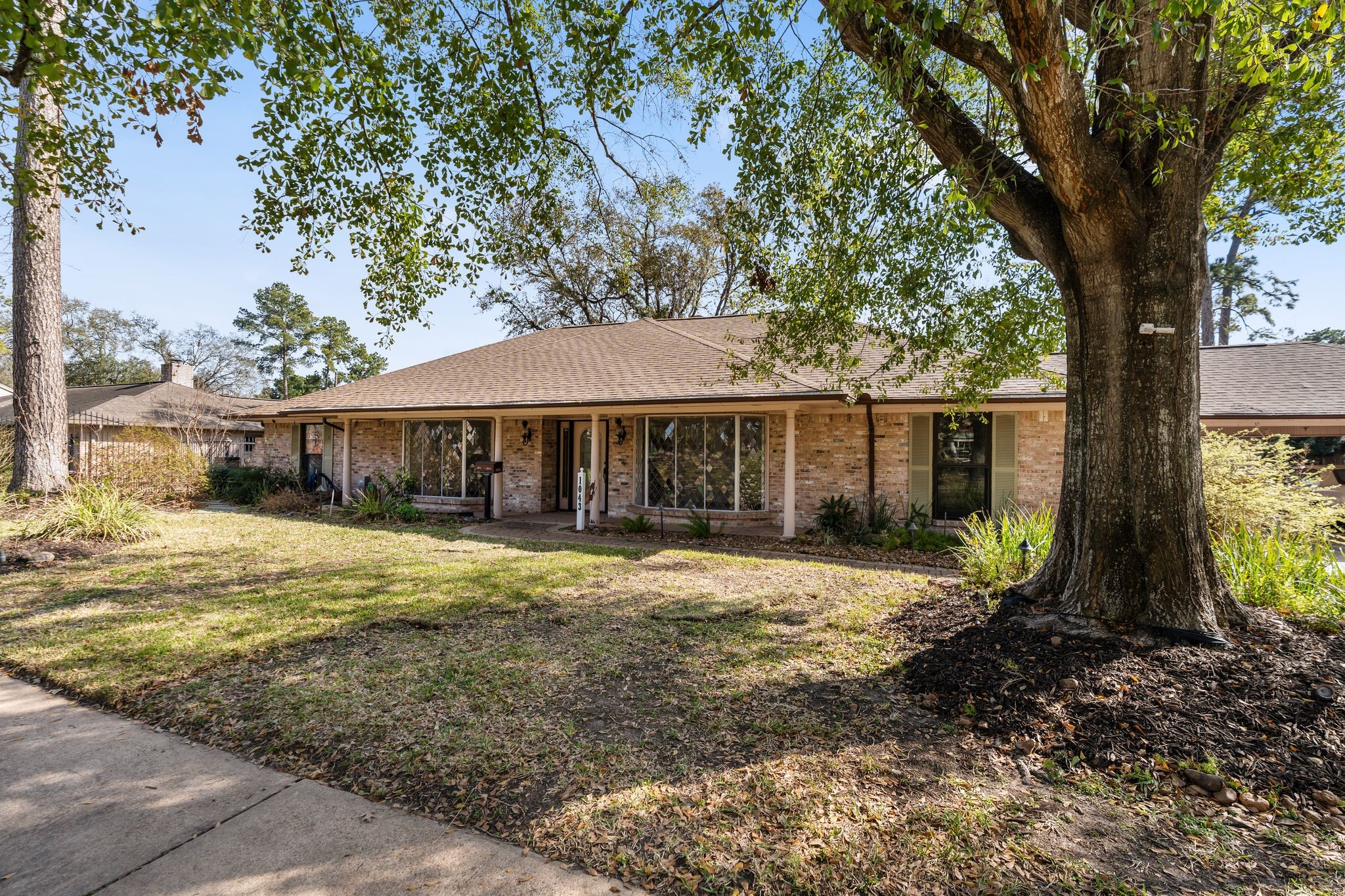 1043 Martin Street Houston, TX 77018 - Photo 6 of 45 a front view of a house with a yard