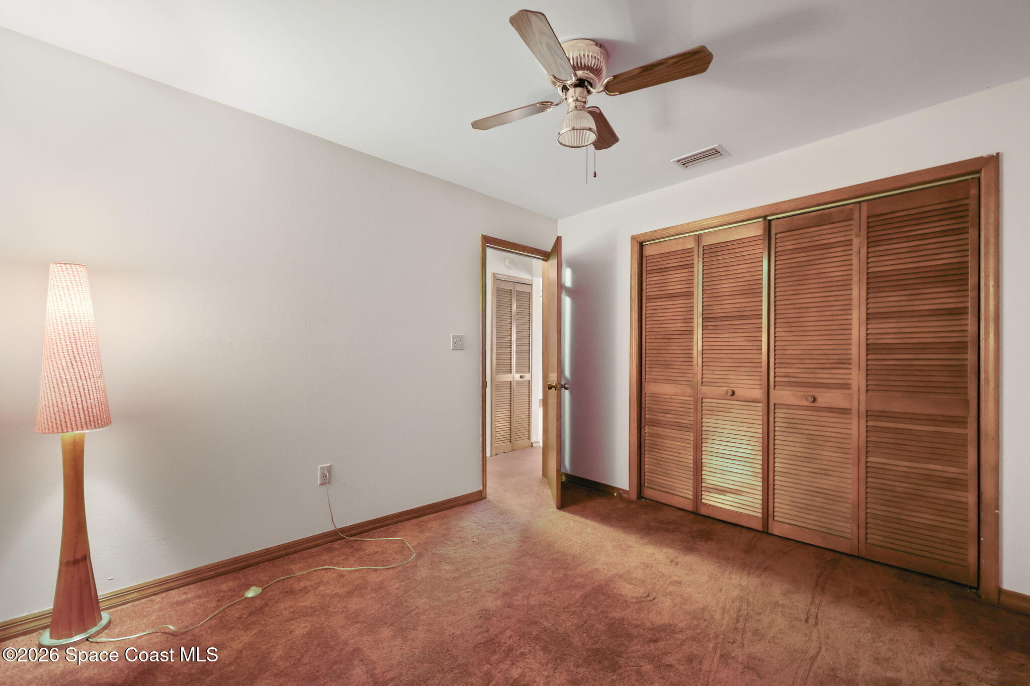 7256 Bright Avenue Cocoa, FL 32927 - Photo 19 of 29 Guest bedroom