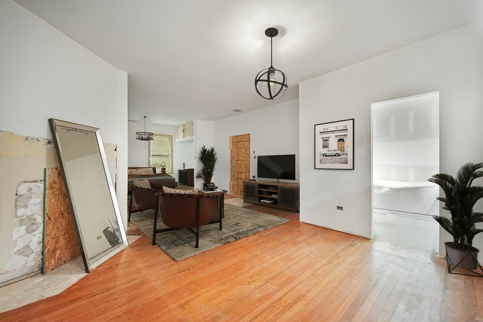 2163 Chestnut Road Homewood, IL 60430 - Photo 13 of 31 a living room with furniture and a flat screen tv