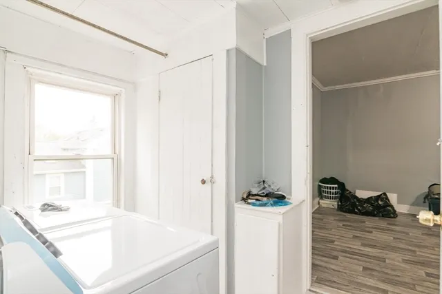 a white bath tub sitting next to a window