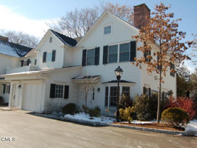 220 Riverside Avenue, Unit D12 Westport, CT 06880 - Photo 1 of 1 front view of a house with a yard