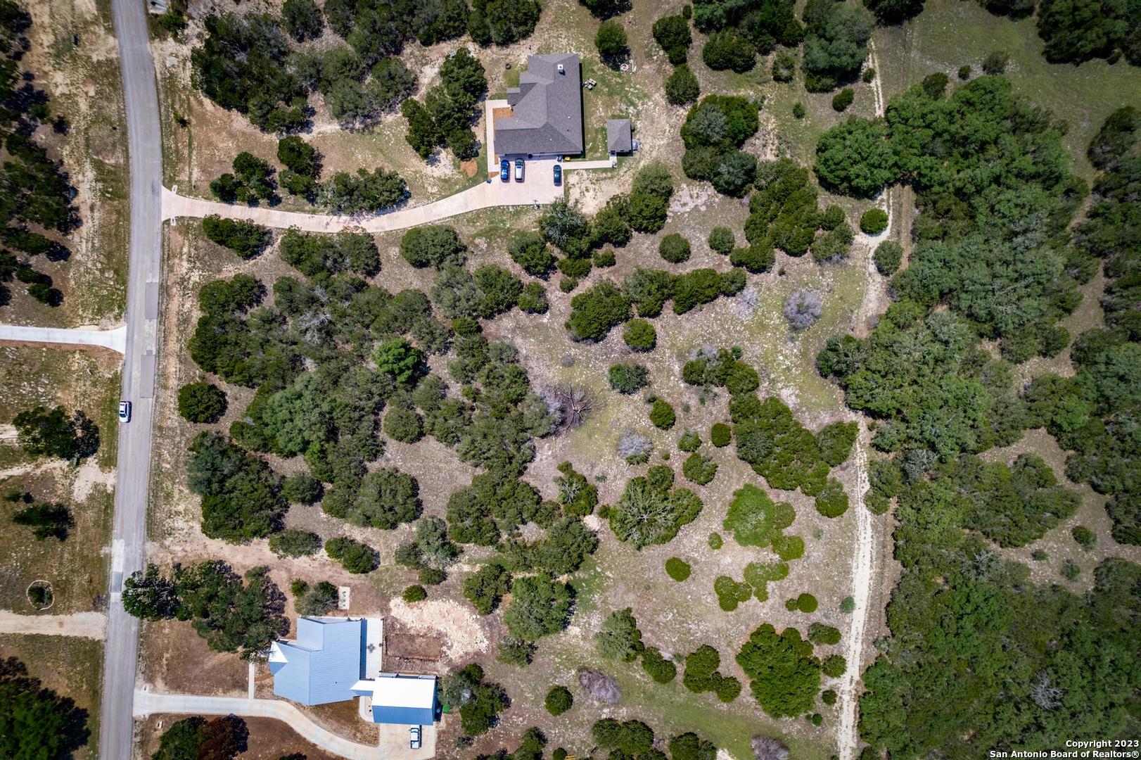Lot 12 Rio Azul Pipe Creek, TX 78063 - Photo 11 of 30 an aerial view of house with yard