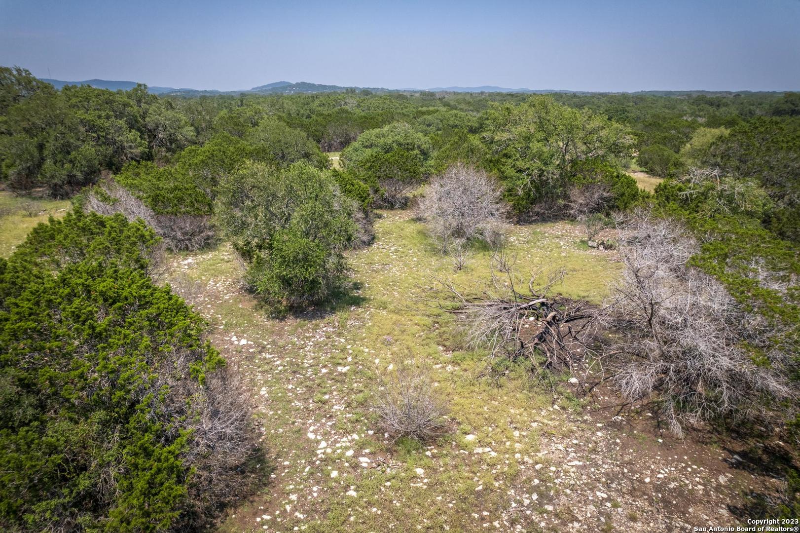 Lot 12 Rio Azul Pipe Creek, TX 78063 - Photo 25 of 30 a view of lake with green space