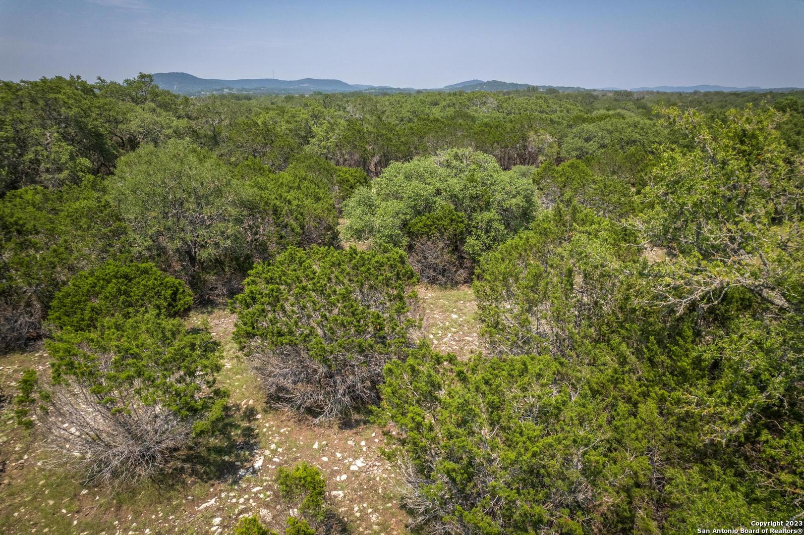 Lot 12 Rio Azul Pipe Creek, TX 78063 - Photo 29 of 30 a view of a yard with an outdoor seating