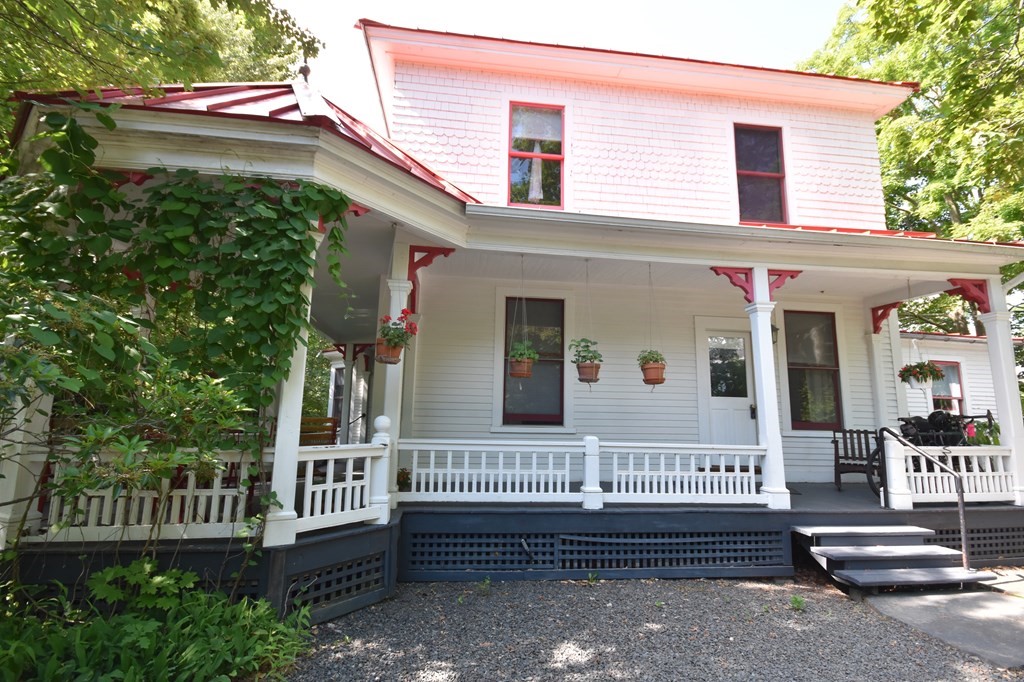71 North Prospect Street Amherst, MA 01002 - Photo 1 of 1 a view of a house with a small yard and wooden floor and fence
