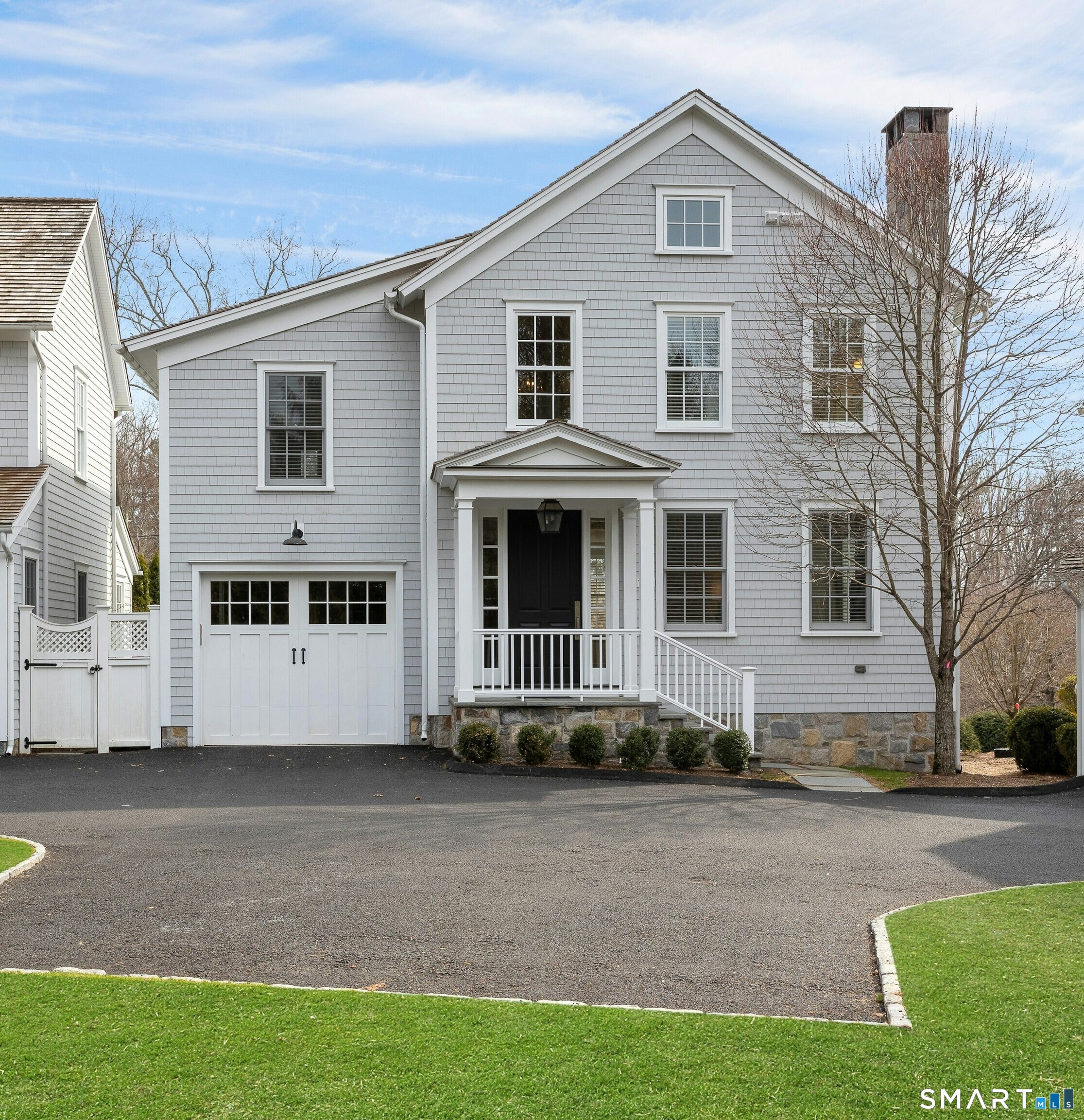 45 Jelliff Mill Road, Unit 45 New Canaan, CT 06840 - Photo 1 of 36 a view of a house with a yard
