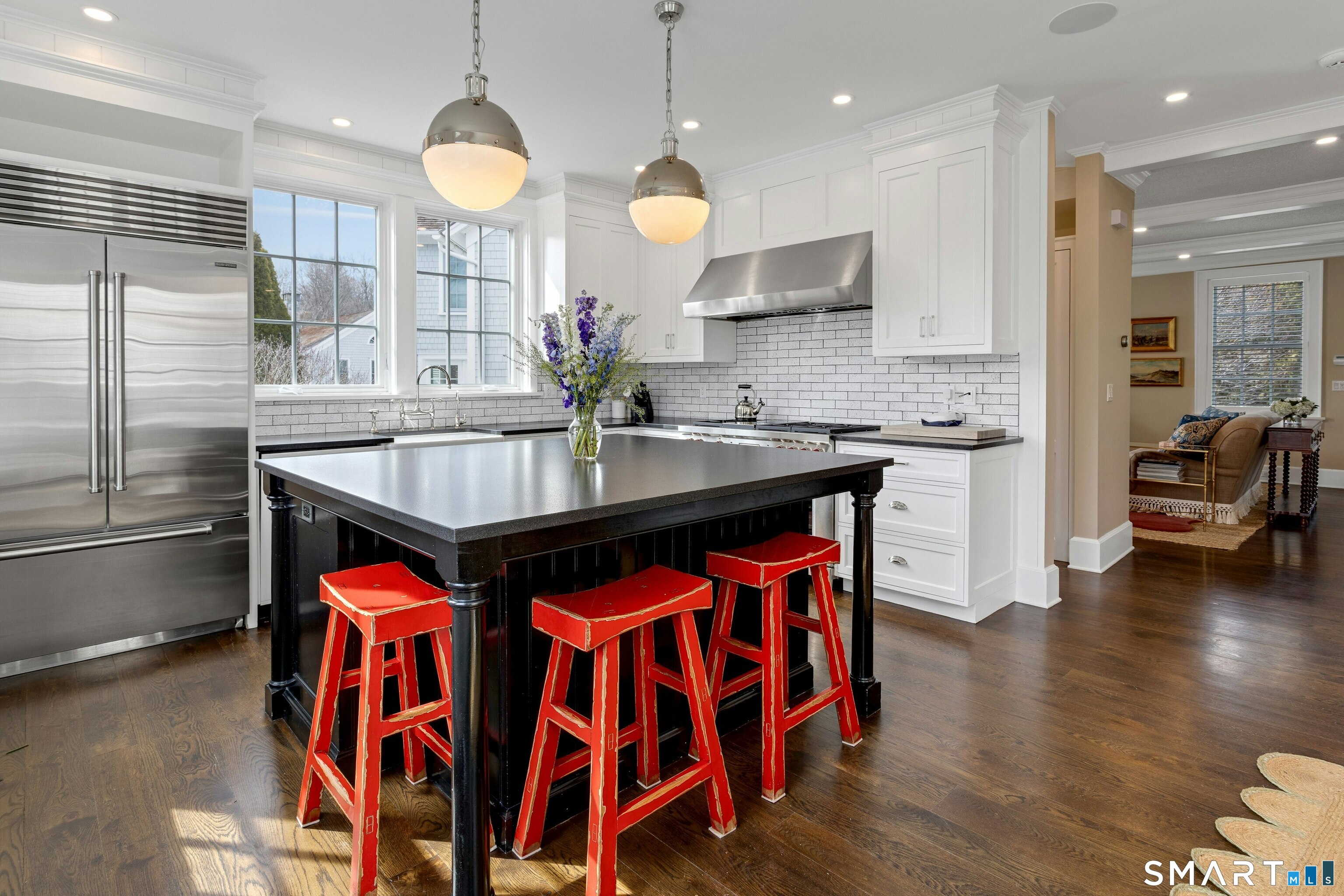 45 Jelliff Mill Road, Unit 45 New Canaan, CT 06840 - Photo 11 of 36 a kitchen with stainless steel appliances granite countertop a stove a sink and a refrigerator