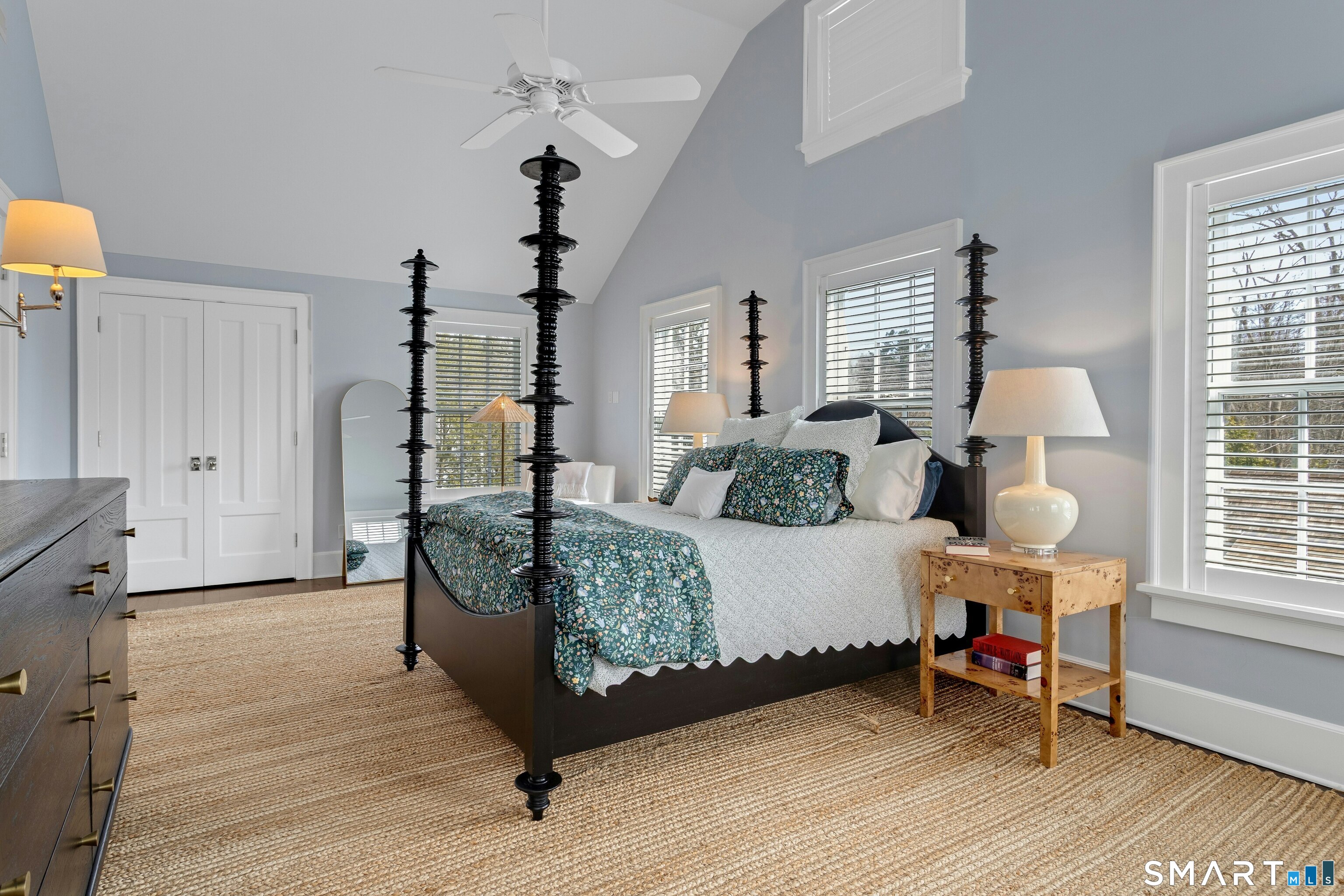 45 Jelliff Mill Road, Unit 45 New Canaan, CT 06840 - Photo 18 of 36 a bed room with a bed window and a chair