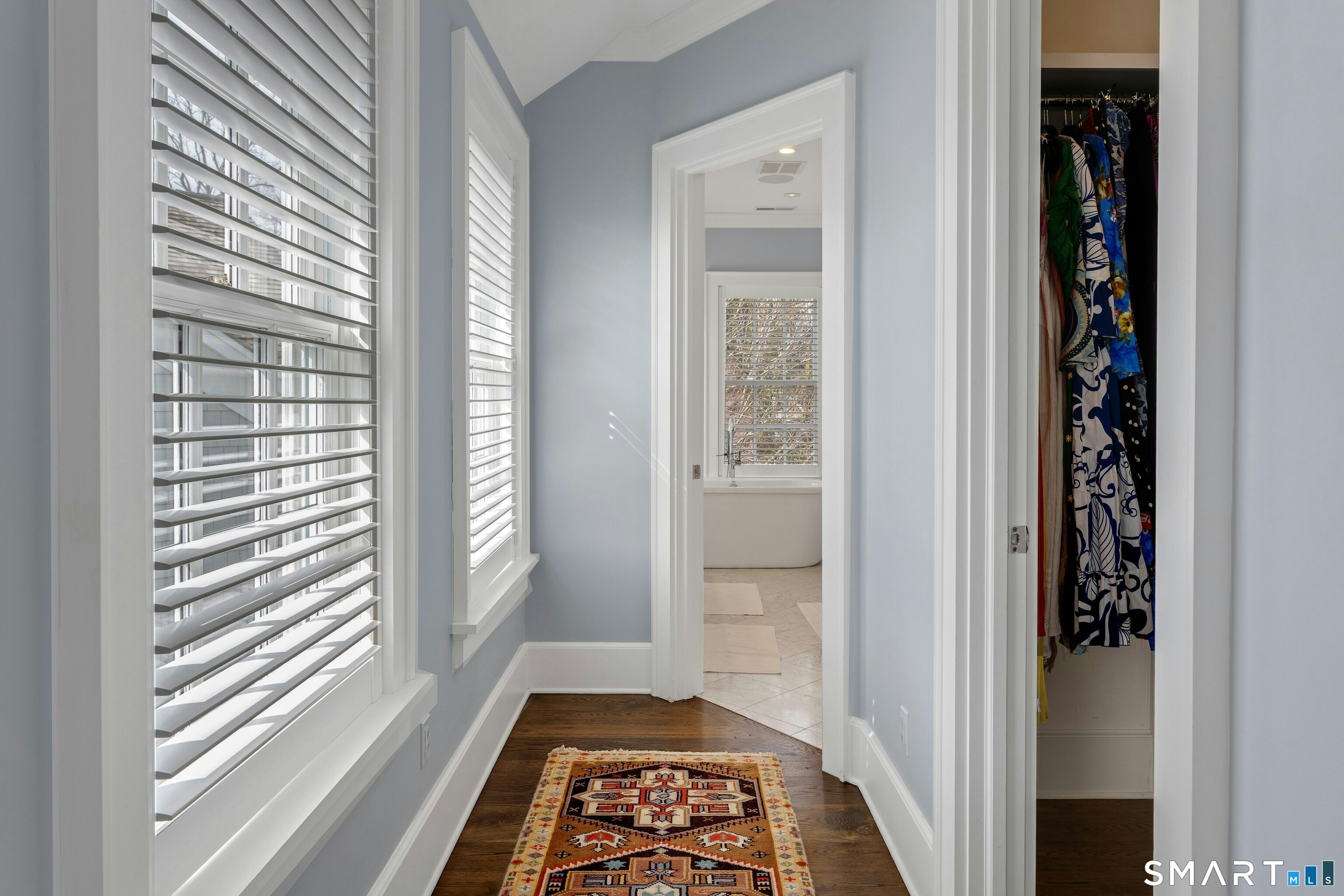 45 Jelliff Mill Road, Unit 45 New Canaan, CT 06840 - Photo 19 of 36 a view of hallway with a rug and a window