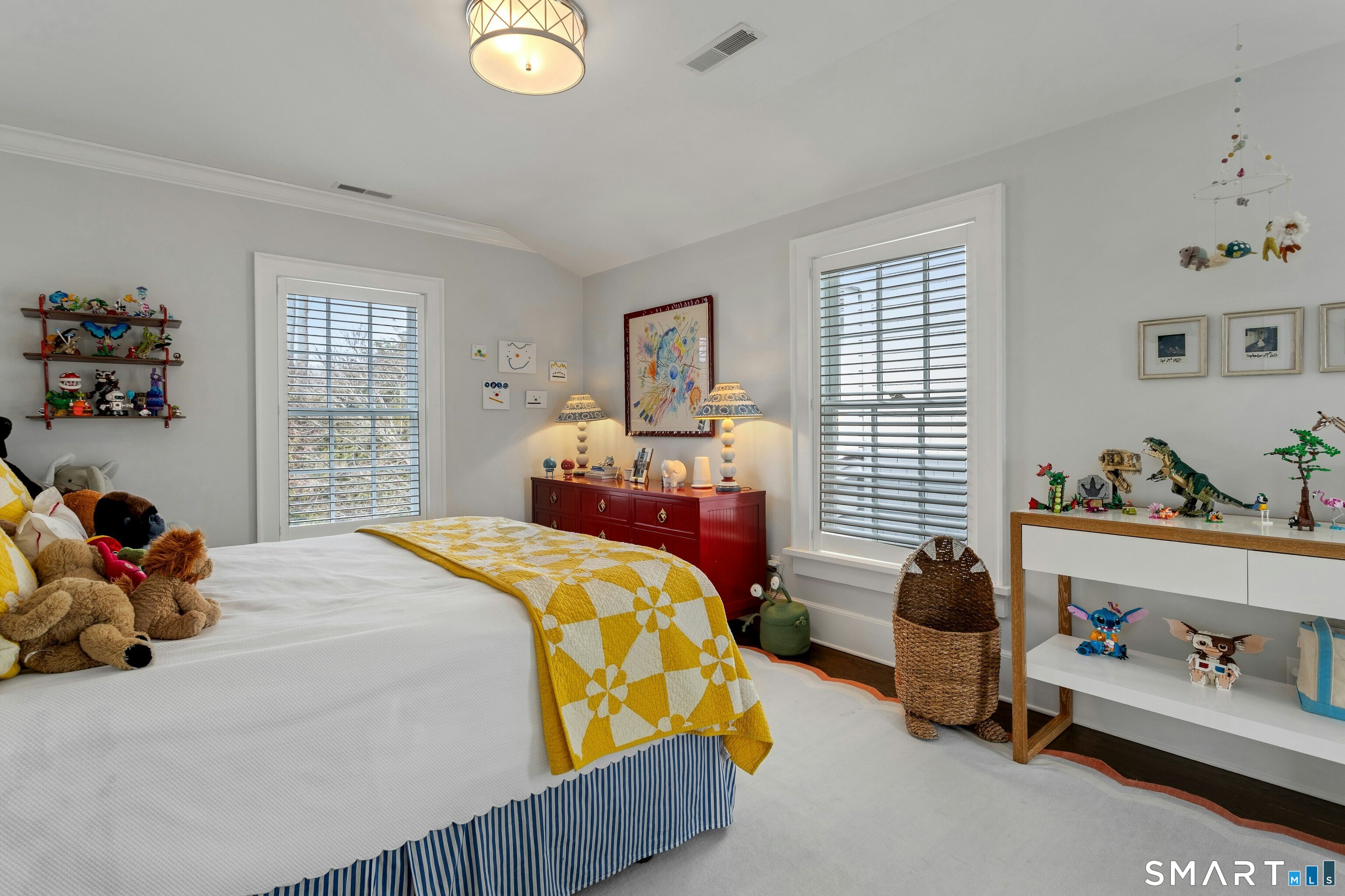 45 Jelliff Mill Road, Unit 45 New Canaan, CT 06840 - Photo 23 of 36 a bedroom with a bed and a window