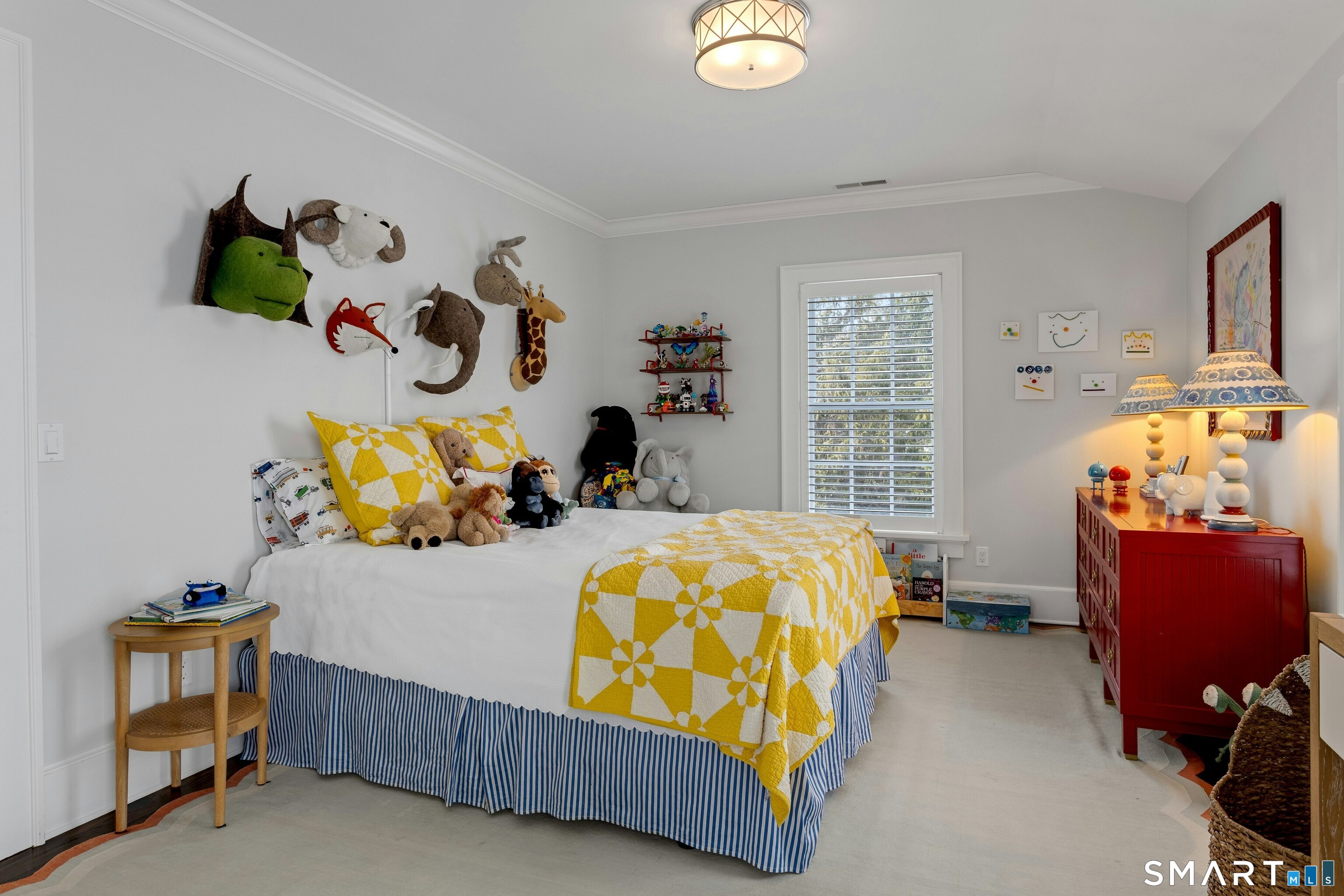 45 Jelliff Mill Road, Unit 45 New Canaan, CT 06840 - Photo 24 of 36 a bedroom with bed and window