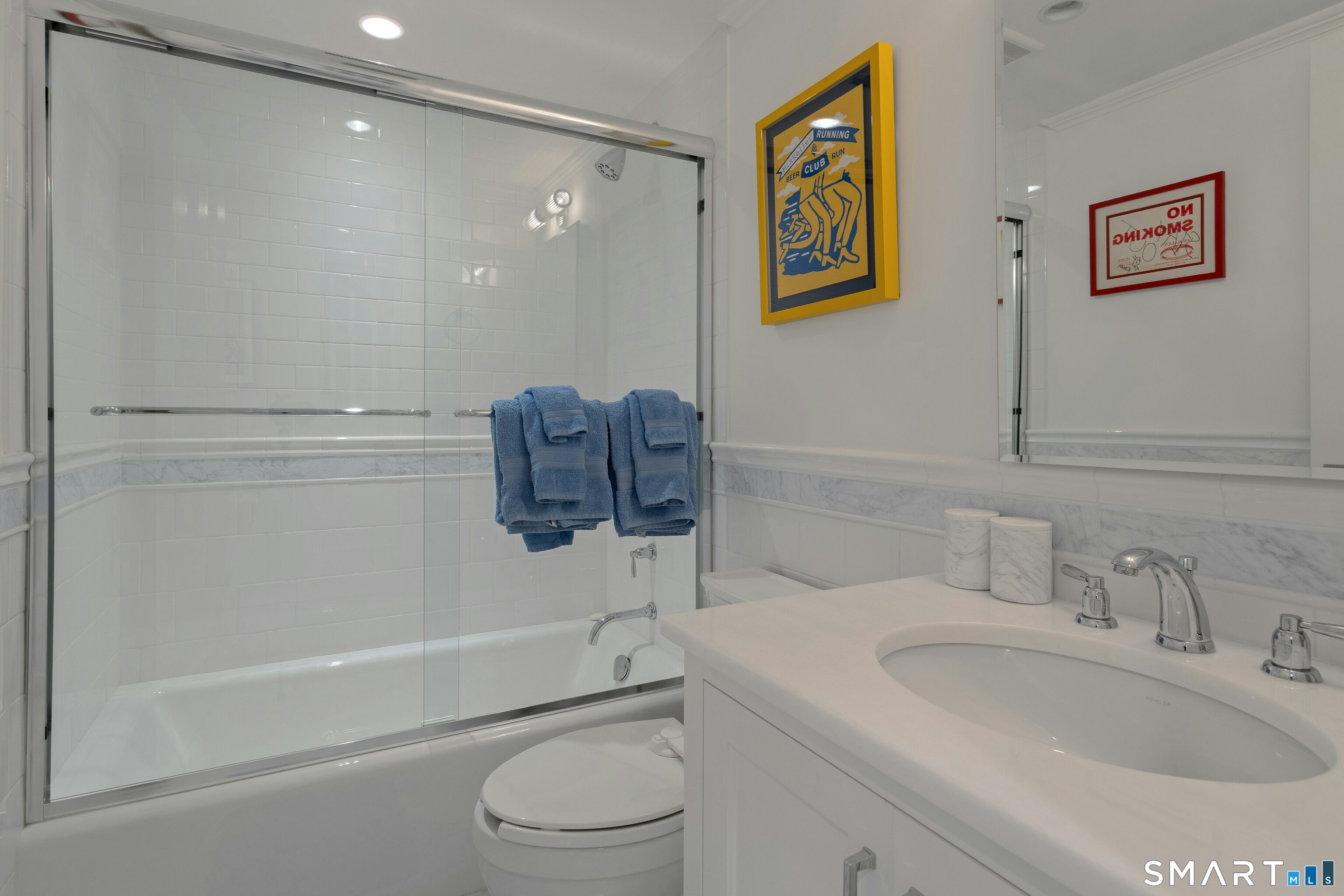 45 Jelliff Mill Road, Unit 45 New Canaan, CT 06840 - Photo 32 of 36 a bathroom with a toilet sink and bathtub