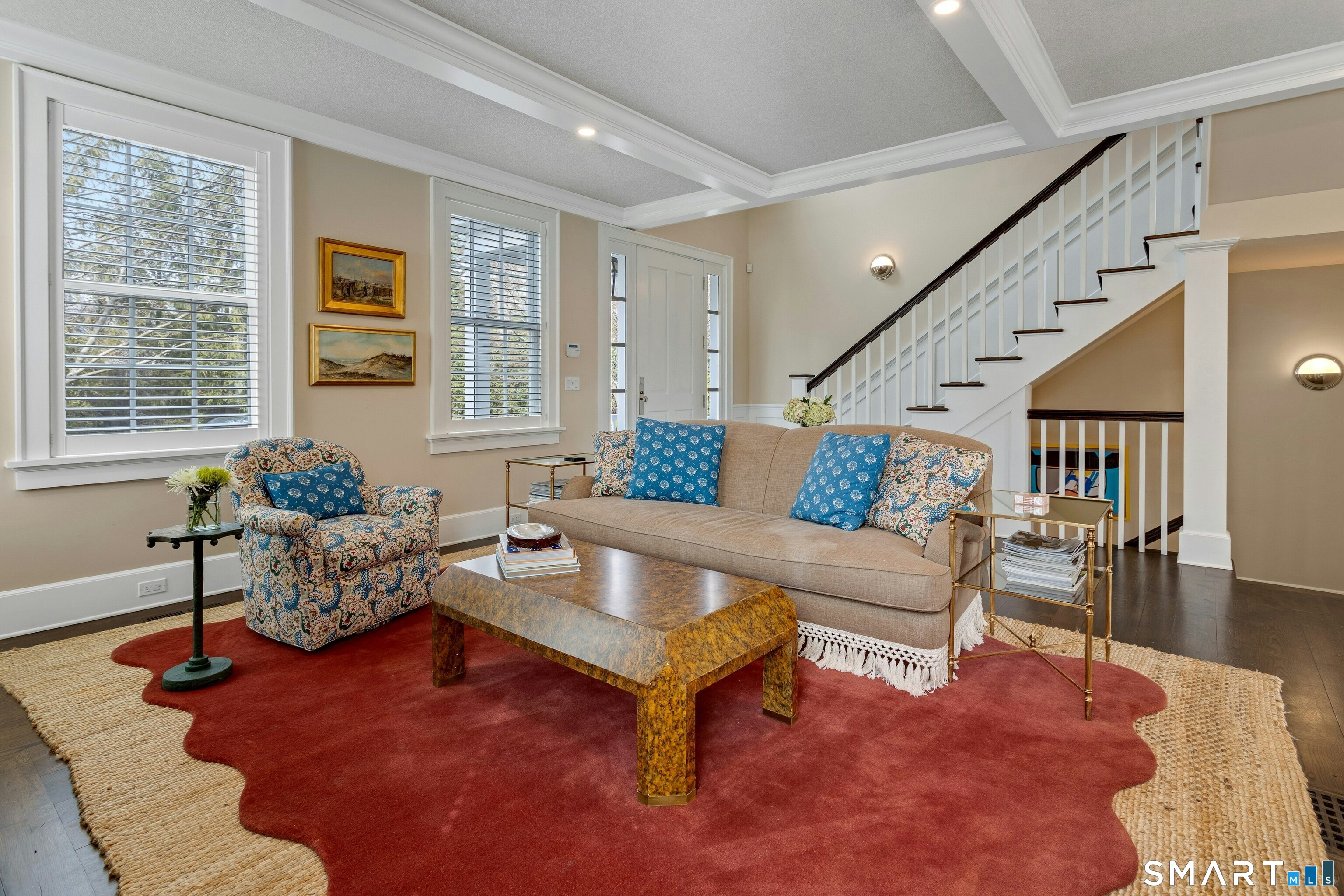 45 Jelliff Mill Road, Unit 45 New Canaan, CT 06840 - Photo 5 of 36 a living room with furniture and windows