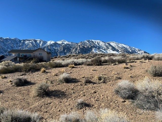 4811 Sherwin Trail Bishop, CA 93514 - Photo 2 of 6 a view of a dry field with mountains in the background