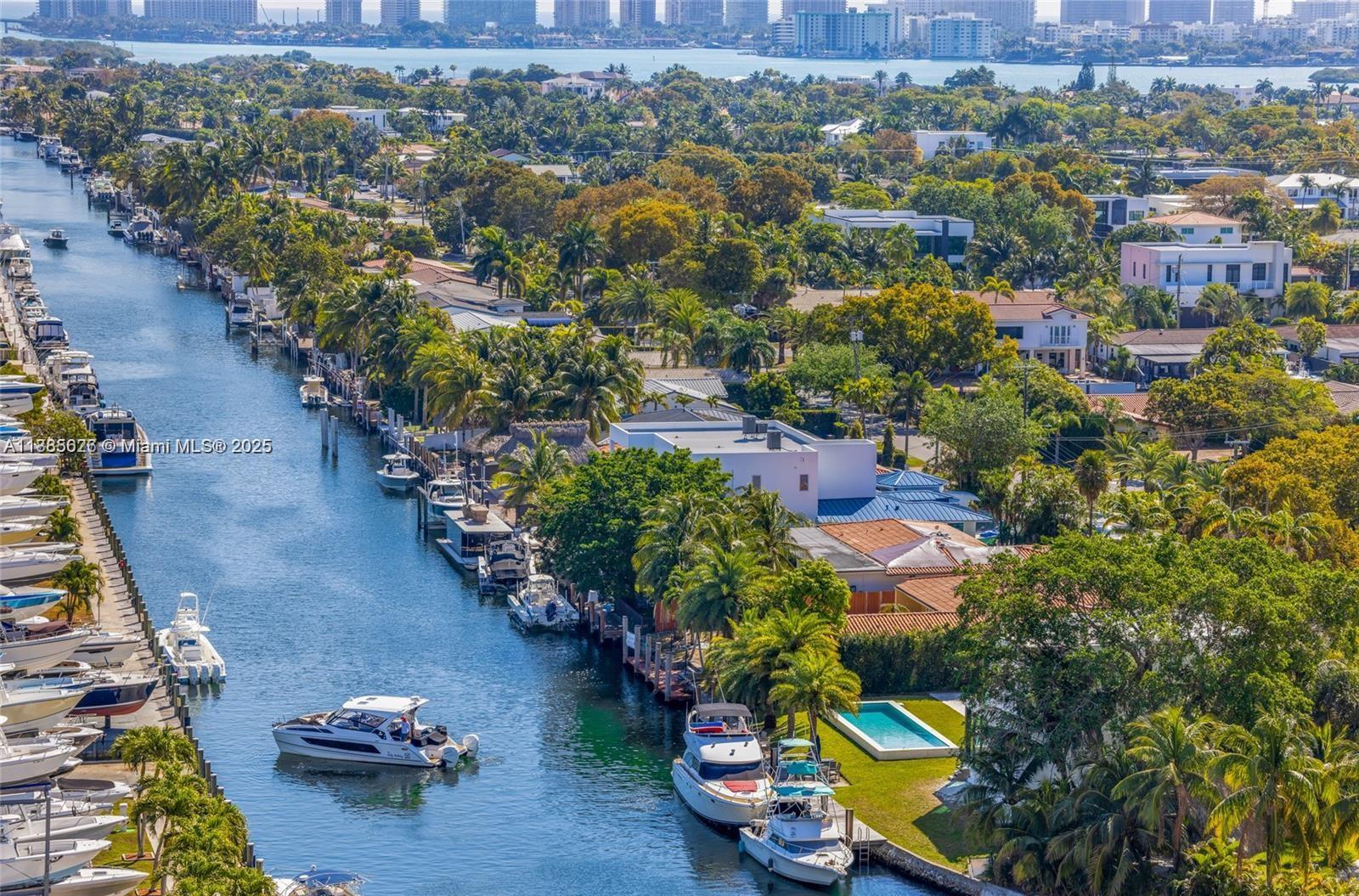 13499 Biscayne Boulevard, Unit 1603 North Miami, FL 33181 - Photo 3 of 4 an aerial view of a house with a yard swimming pool and outdoor seating