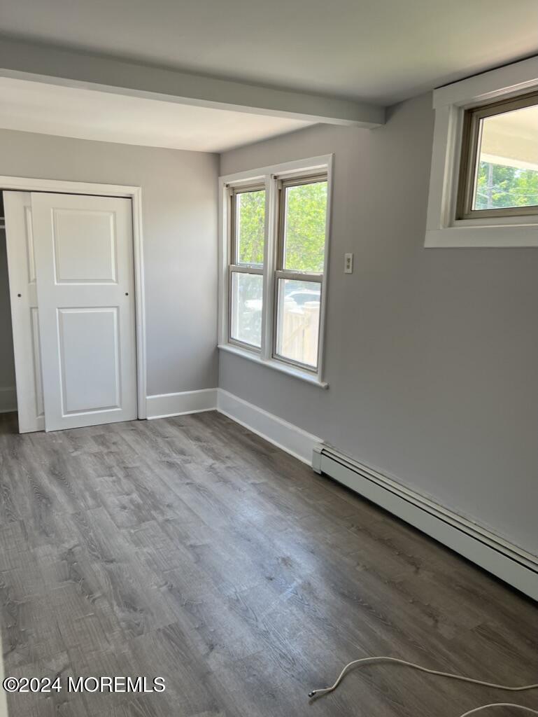 615 2nd Avenue, Unit 1 Asbury Park, NJ 07712 - Photo 11 of 39 an empty room with a window